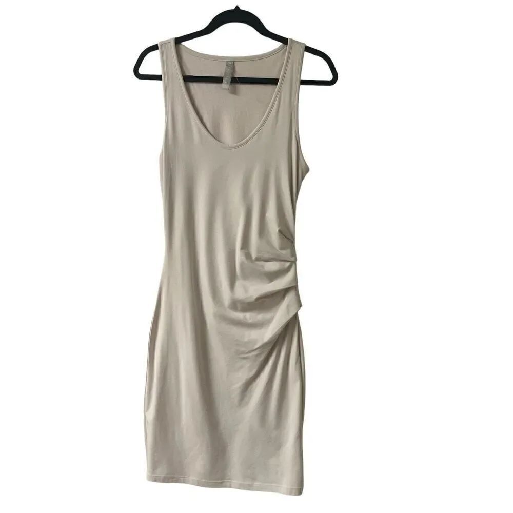 Athleta Della dress blush color ruched side sz. Small